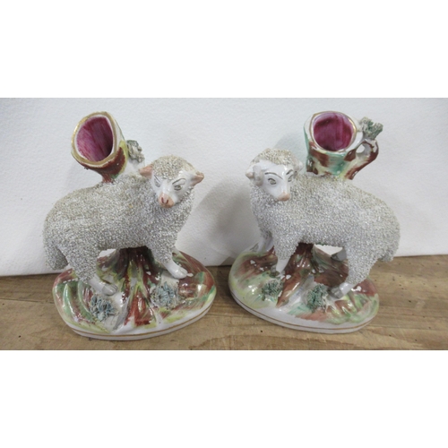 225 - A collection of Staffordshire models of sheep