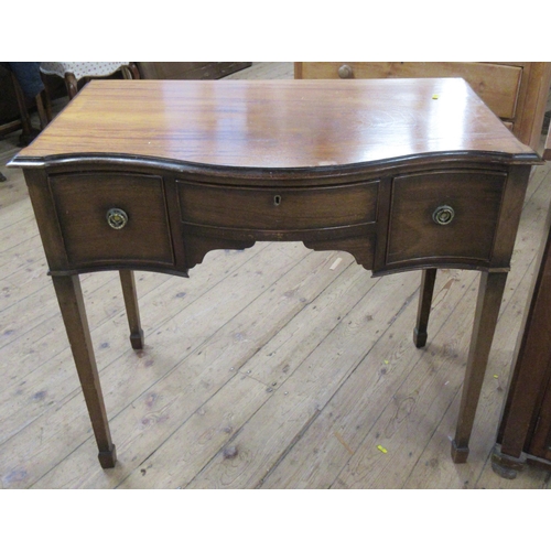 23 - A mahogany cabinet, together with a sofa table and sideboard