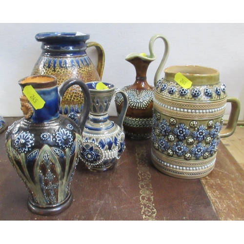 245 - Five Doulton Lambeth jugs