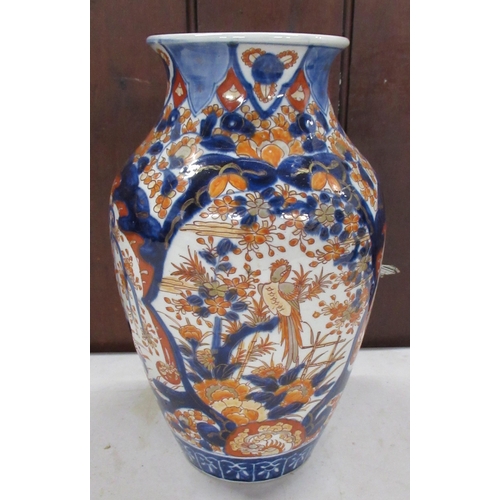 247 - A late 19th century Imari vase, decorated in typical palette, height 12ins