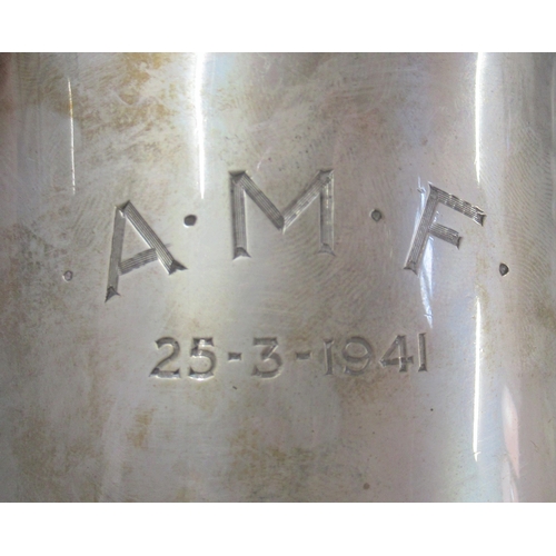 257 - A hallmarked silver tankard, engraved with date and initials, height 4.5ins, weight 11.5oz