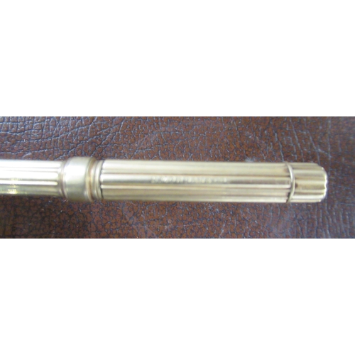 276 - A Morden and Co gold propelling pencil together with another, together with a silver vesta case, cha... 