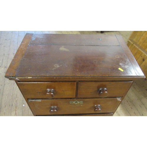 28 - A narrow oak chest, of two short over three long drawers, on bun feet, 26.5ins x 16.5ins, height 40.... 