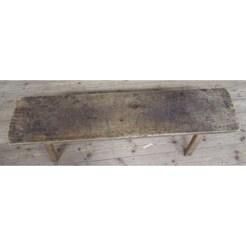 3 - A low pine bench, raised on four legs, length 60ins, wide 14ins, height 17ins