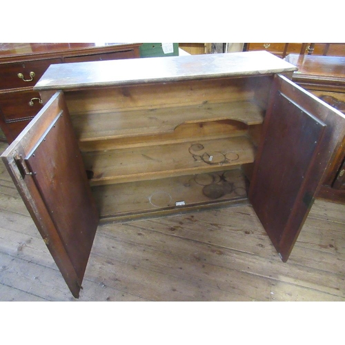 33 - An Edwardian walnut side board together with a mahogany cabinet