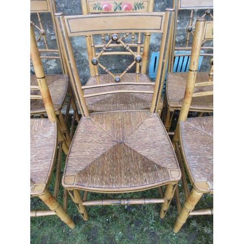 45 - A set of six rush seated chairs 3 of which have floral painted decoration