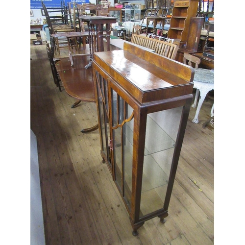 54 - A reproduction extending dining table together with a coffee table , nest of tables, display cabinet... 