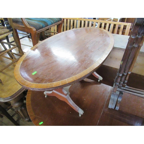 54 - A reproduction extending dining table together with a coffee table , nest of tables, display cabinet... 