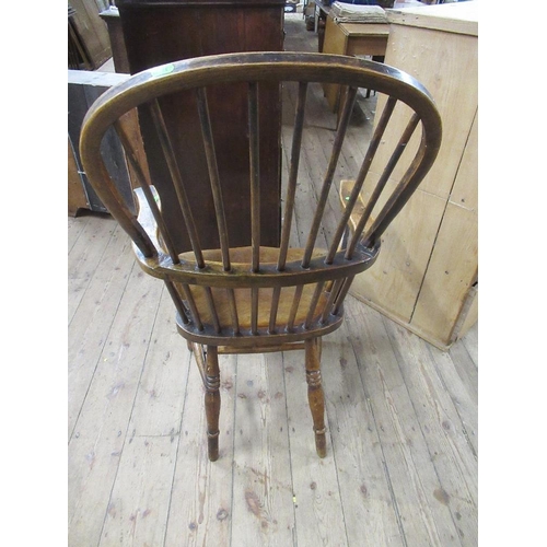 58 - An antique Windsor arm chair