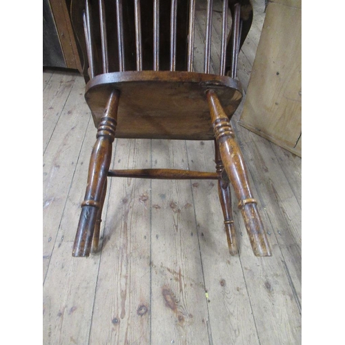 58 - An antique Windsor arm chair