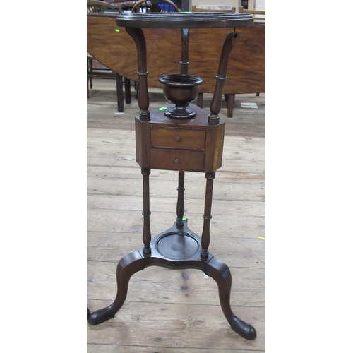 63 - A pair of 19th century mahogany wash/wig stands, fitted with a well for a bowl, over two small drawe... 