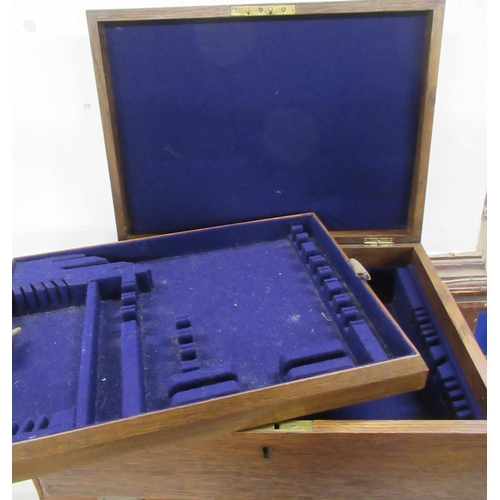 66 - Three vintage suitcases, together with an oak cutlery box