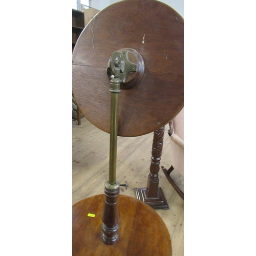 68 - A 19th century mahogany shaving stand, with adjustable mirror, height 60ins