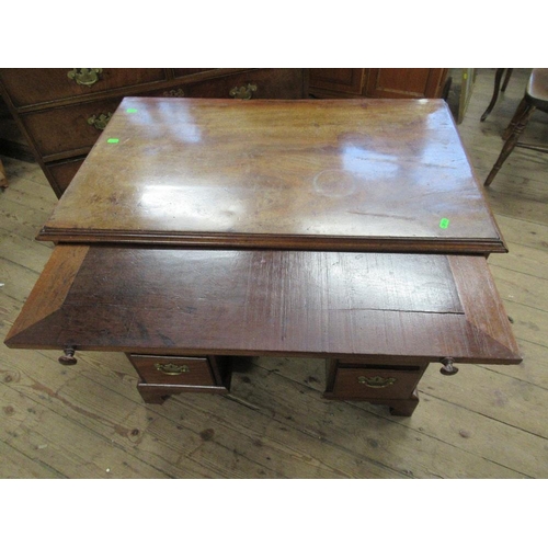 70 - A 19th century mahogany knee hole desk fitted with a brush tray, width 34ins, depth 20ins, height 31... 