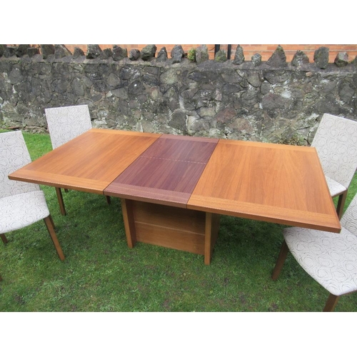 75 - A Skovby Danish extending dining table together with 4 dining chairs with fire labels. width 39ins, ... 