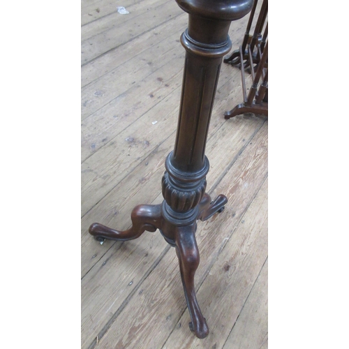 76 - A 19th century mahogany and brass shaving stand, with double sided swivel mirror , one side having a... 