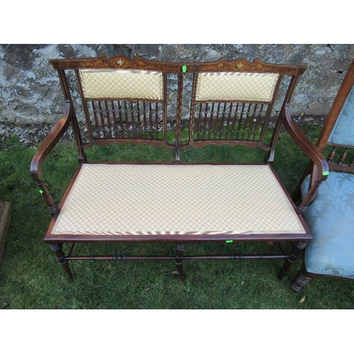 77 - An Edwardian saloon settee with inlaid decoration together with a pair of 19th century dining chairs... 