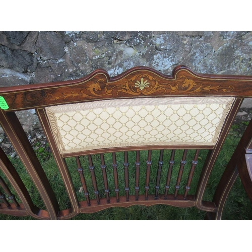 77 - An Edwardian saloon settee with inlaid decoration together with a pair of 19th century dining chairs... 