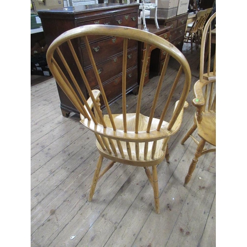 8 - A pair of 20th century Windsor arm chairs