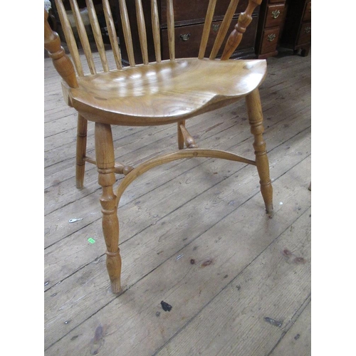 8 - A pair of 20th century Windsor arm chairs