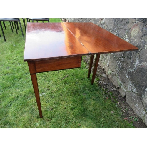 81 - A 19th century fold over dining table width 36ins, height 28ins