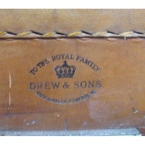 84 - A vintage leather hat box together with a Drew & Sons London leather hat box