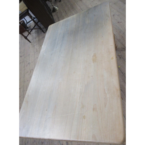 92 - A modern pine dining table, 60ins x 36ins, height 31ins