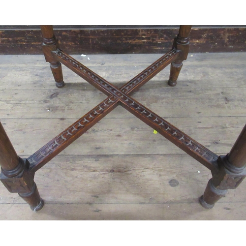 98 - A square carved oak centre table, 24ins x 24ins, height 28ins