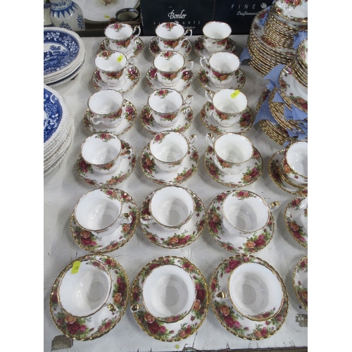 304 - A large collection of Royal Albert 'Old Country Rose' pattern tea and dinnerware