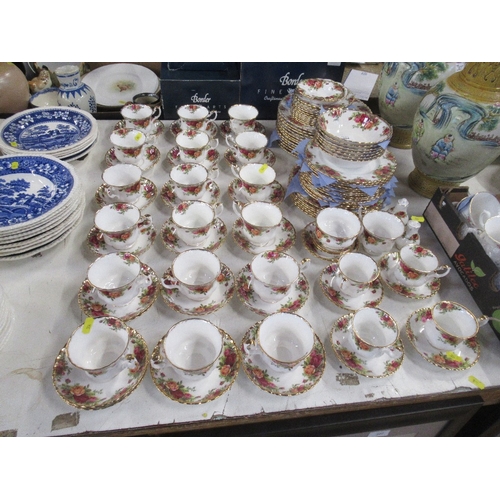 304 - A large collection of Royal Albert 'Old Country Rose' pattern tea and dinnerware