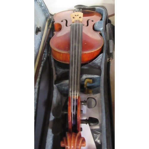 365 - Six cased violins