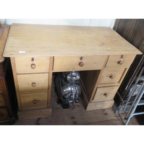 13 - An Antique pine desk, with an arrangement of 7 drawers round the kneehole, 43ins x 24ins, height 31i... 