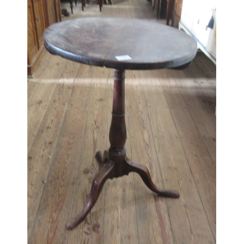 14 - An Antique mahogany tilt top table, with circular top, diameter 19.5ins, height 27.75ins