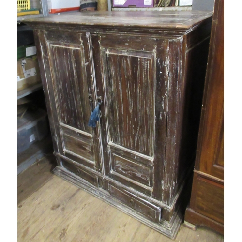 15 - A wooden cabinet, fitted with a cupboard over drawers, 43ins x 25.5ins, height 49ins