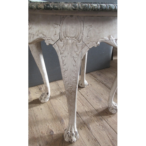 22 - An Antique marble top occasional table, the broken marble top over a painted base, raised on four ca... 