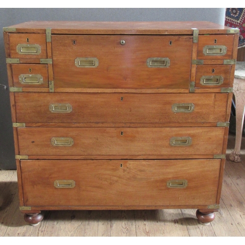 23 - A 19th century mahogany campaign or military chest comprising 2 sections with brass mounts, the uppe... 