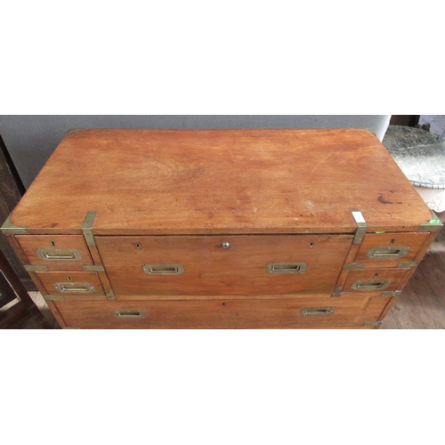 23 - A 19th century mahogany campaign or military chest comprising 2 sections with brass mounts, the uppe... 