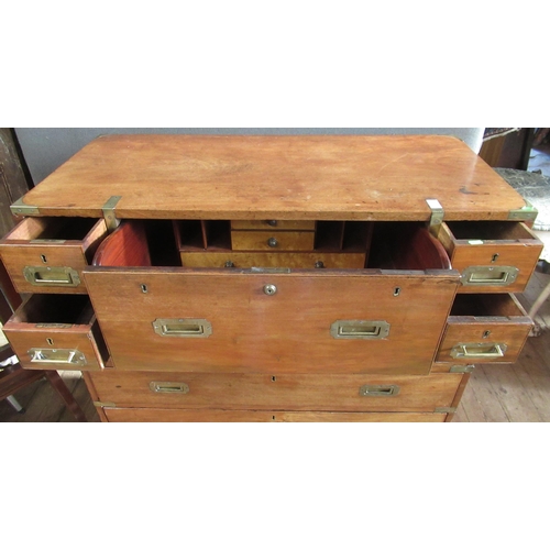 23 - A 19th century mahogany campaign or military chest comprising 2 sections with brass mounts, the uppe... 