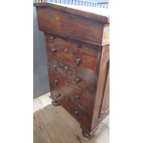 26 - A 19th century rosewood davenport, with inset leather sloping writing surface, the interior fitted w... 