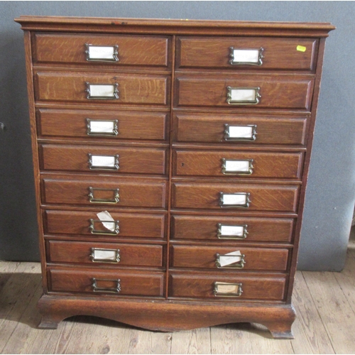 28 - An oak set of drawers, consisting of two banks of eight drawers, 36ins x 14.5ins, height 42ins