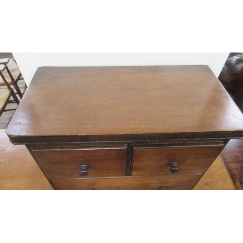 3 - A miniature chest, of two over two drawers, 12ins x 6.25ins, height 15ins