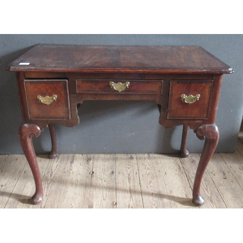 38 - An Antique mahogany low boy, fitted with three drawers, on cabriole legs to pad feet, 36ins x 20.5in... 