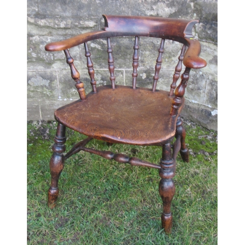 42 - An Antique ash and elm captains chair