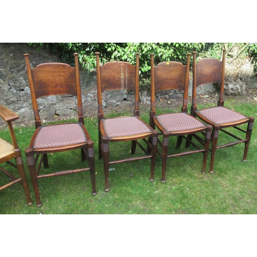 44 - A set of 6 (4+2) William Birch Arts & Crafts oak dining chairs, the armchairs with wicker seats, the... 