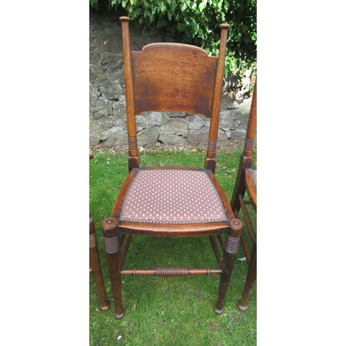 44 - A set of 6 (4+2) William Birch Arts & Crafts oak dining chairs, the armchairs with wicker seats, the... 