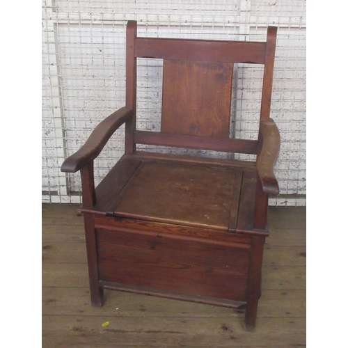 48 - A pine box seat open armchair, with panel back