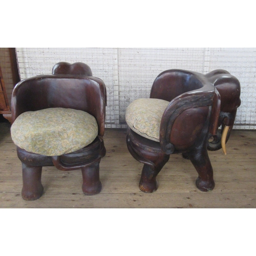 49 - A pair of elephant tub chairs