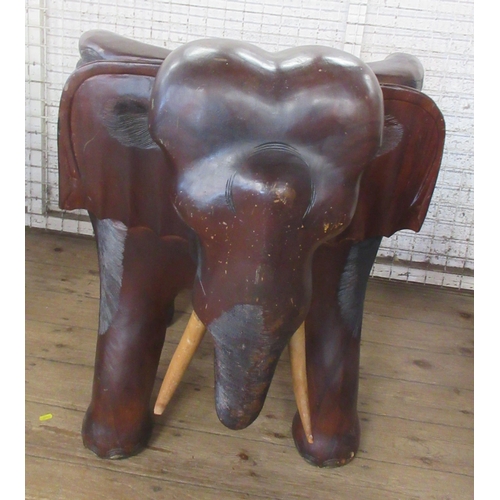 49 - A pair of elephant tub chairs