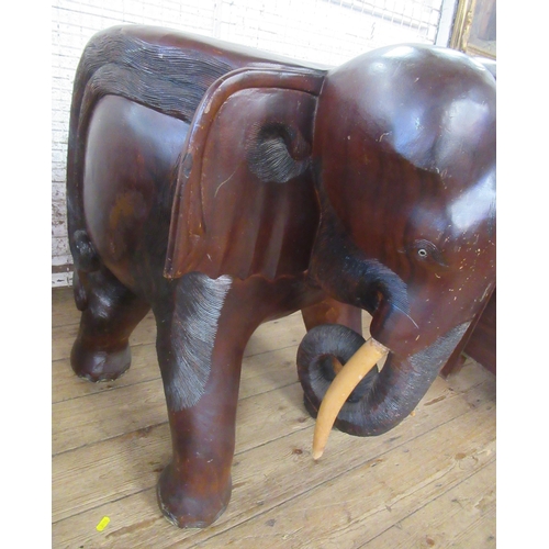 49 - A pair of elephant tub chairs