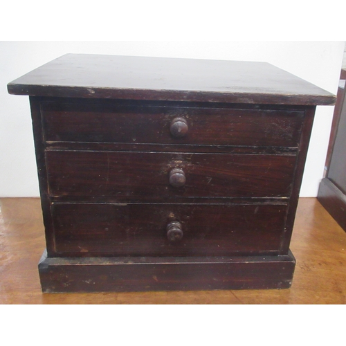 5 - A miniature chest, of three long drawers, 12ins x 9ins, height 9.5ins